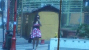 Red Dress walking outdoors