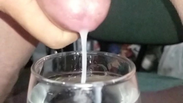 Slo-mo cum in glass of water